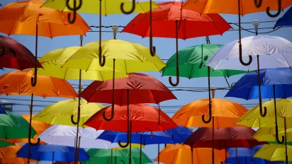 A collection of suspended umbrellas.