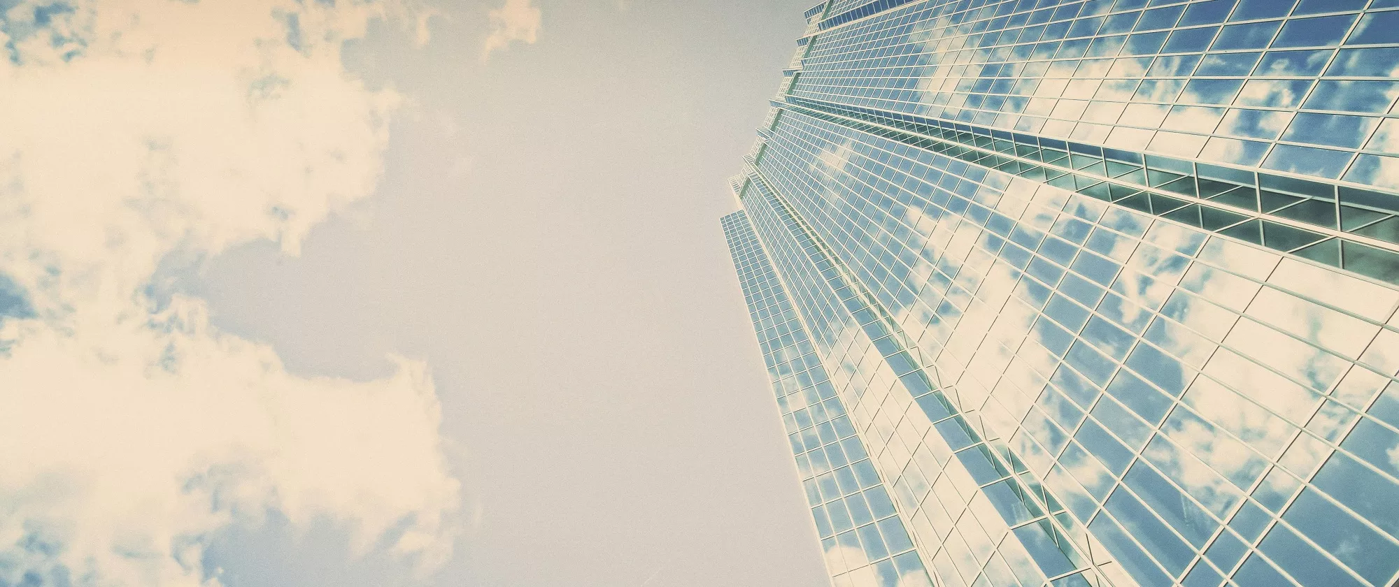 blue sky, cloud and a skyscraper 